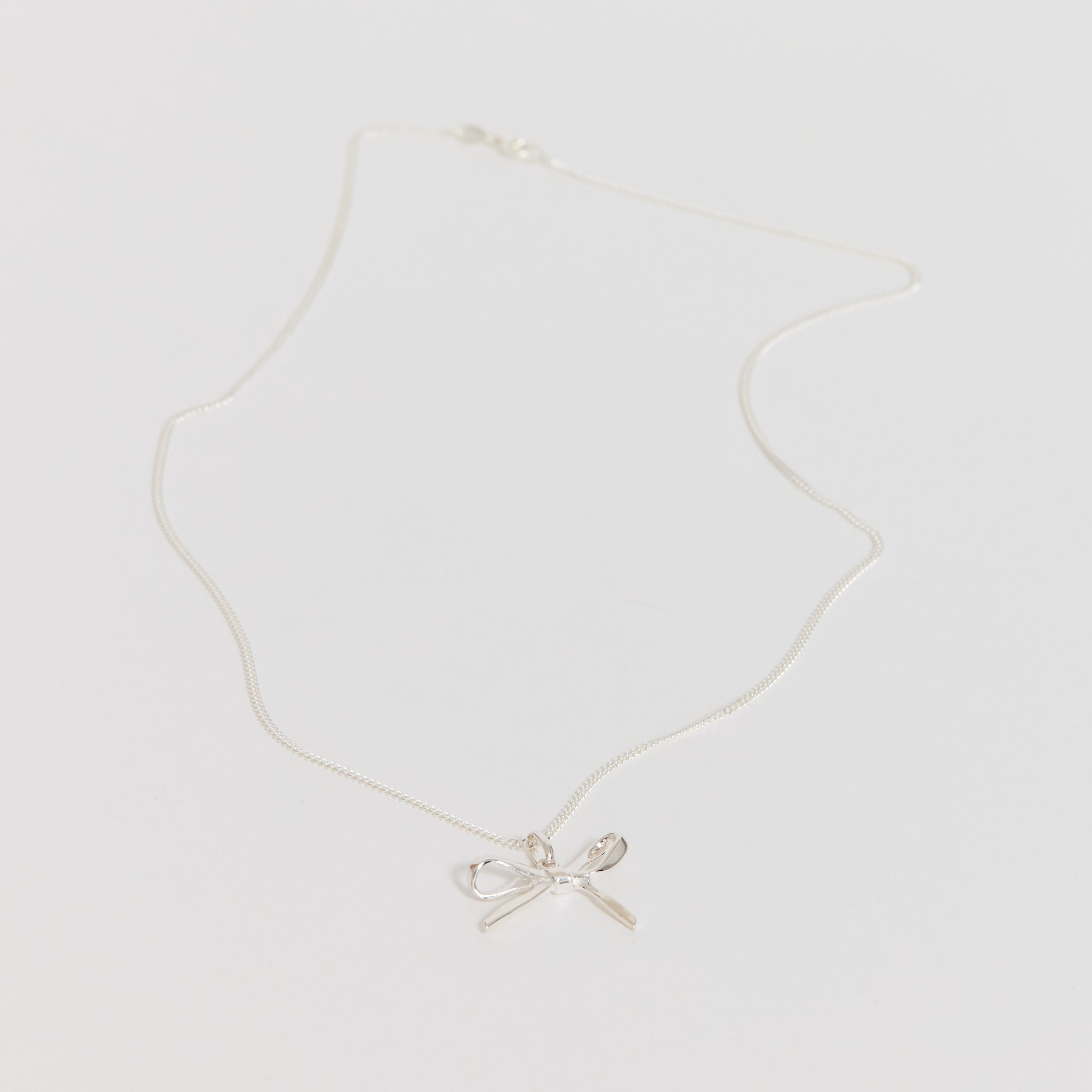 Meadowlark | Bow Charm Necklace Sterling Silver | Maplestore