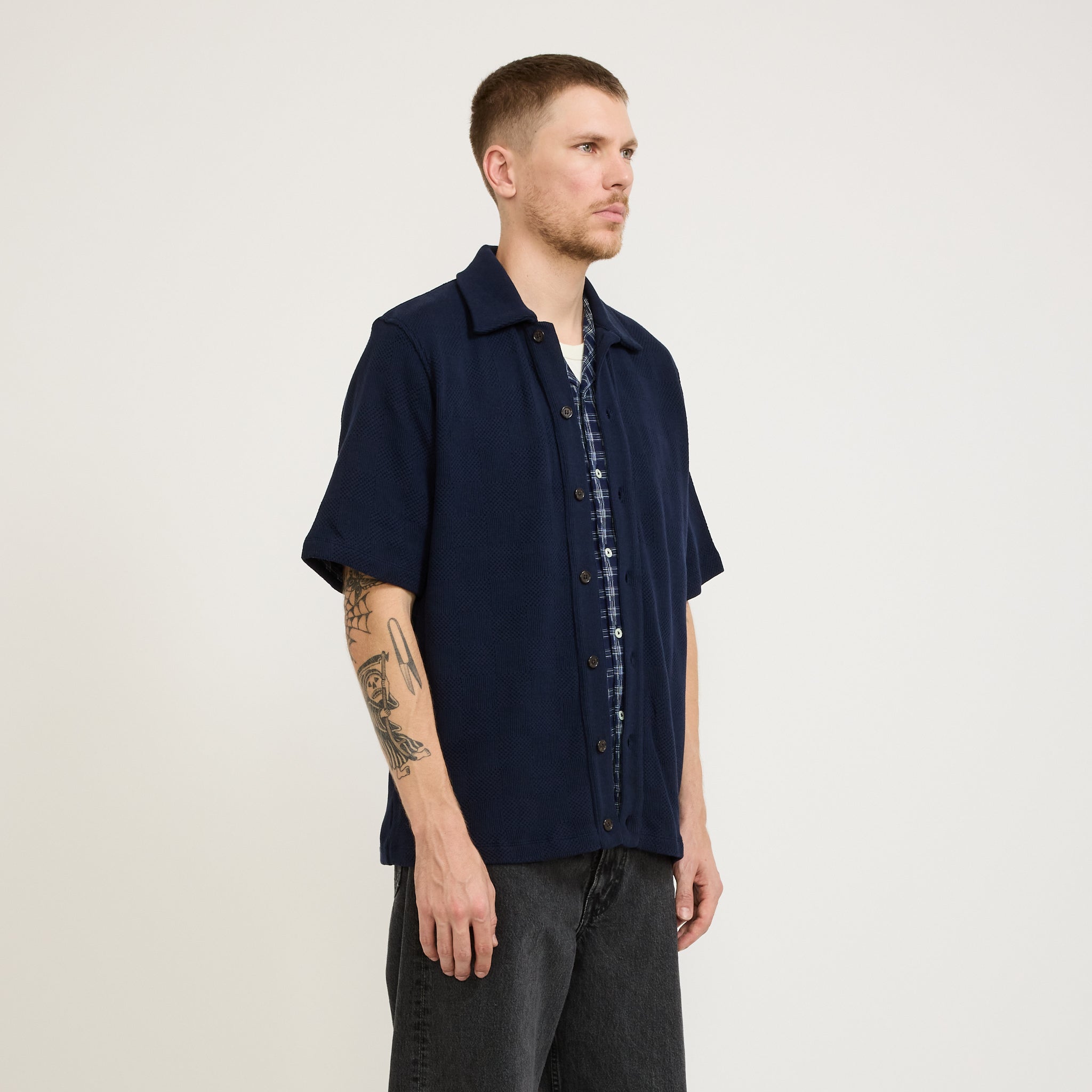 Universal Works | Button Through Polo Fantasy Checkerboard Bright Navy | Maplestore