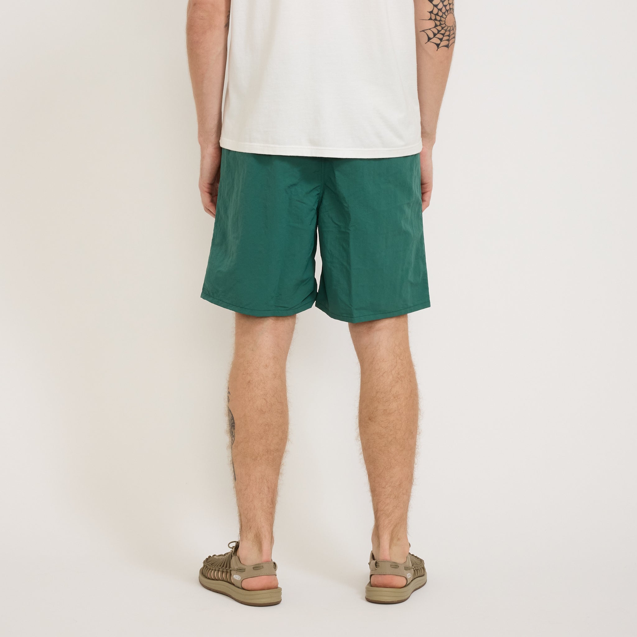Patagonia | Baggies Longs 7 in. GPIW Crest: Conifer Green | Maplestore