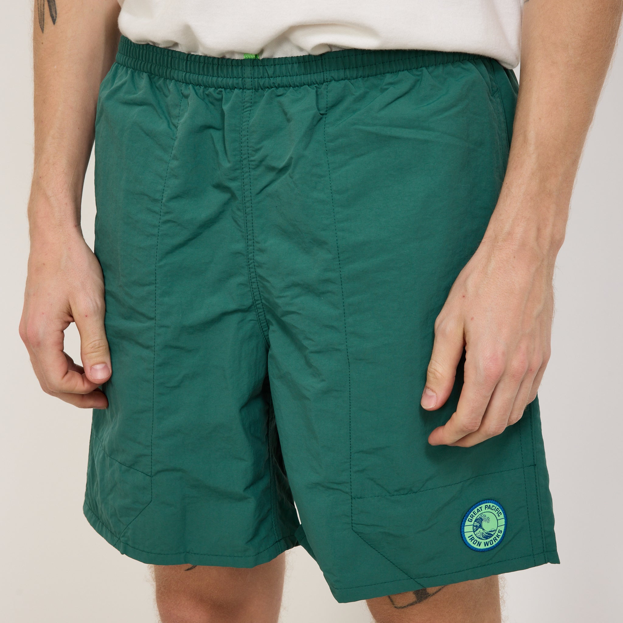 Patagonia | Baggies Longs 7 in. GPIW Crest: Conifer Green | Maplestore