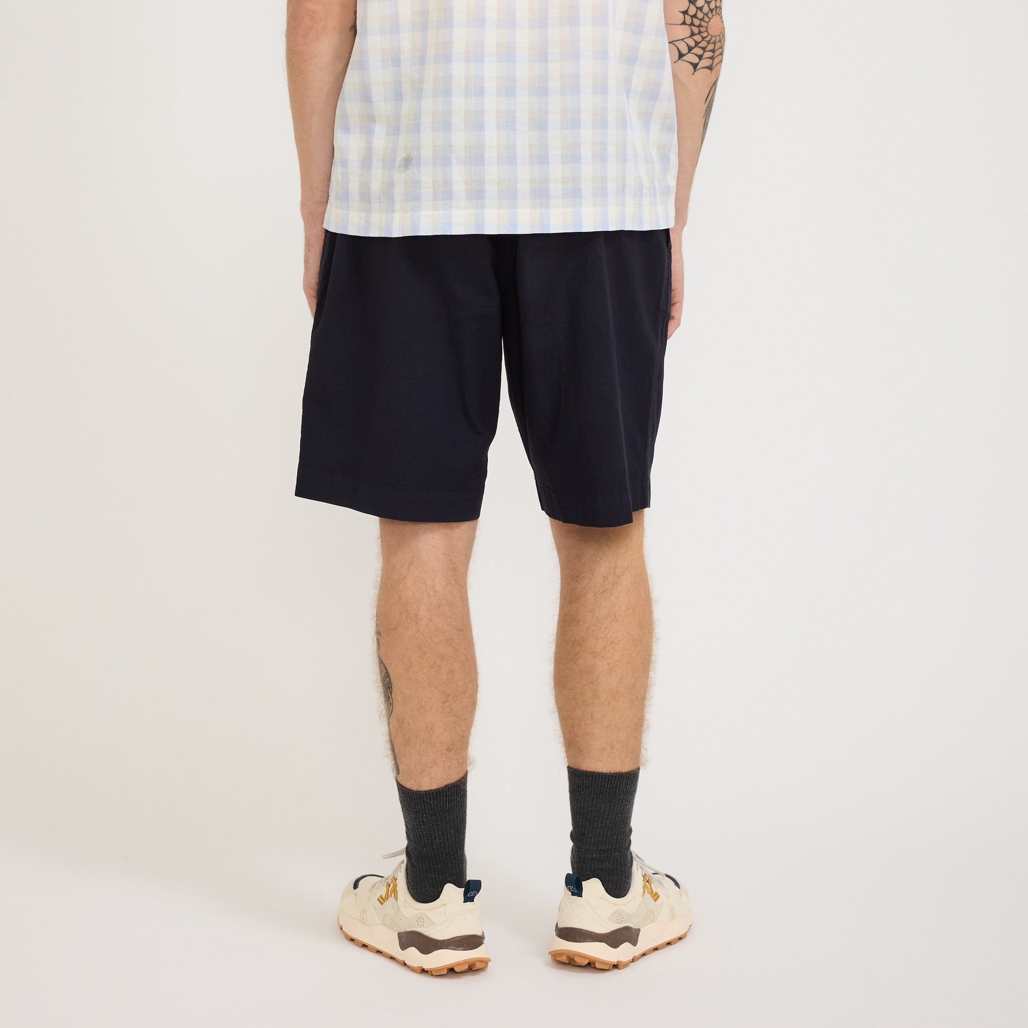 Universal Works | Pleated Track Short Seersucker II Navy | Maplestore