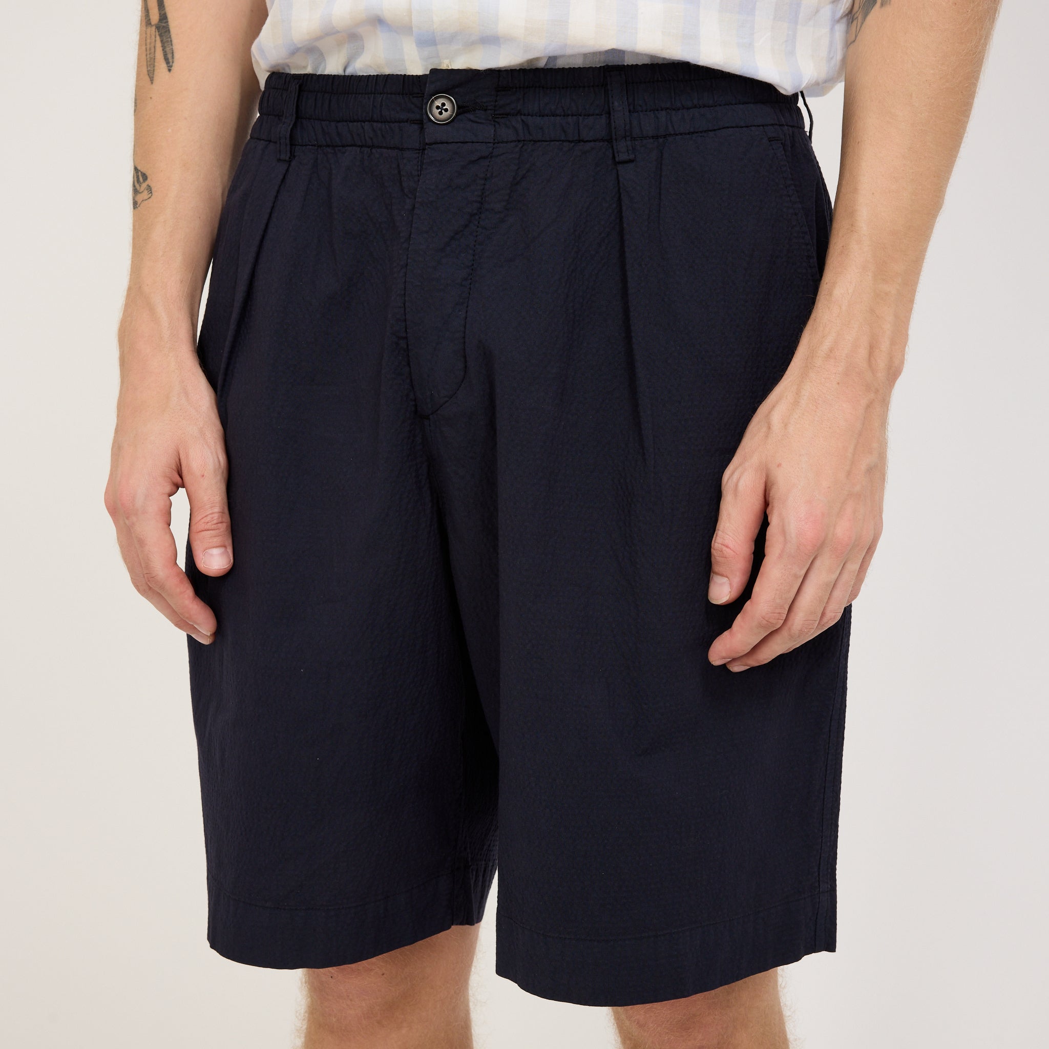 Universal Works | Pleated Track Short Seersucker II Navy | Maplestore